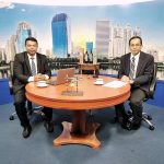 Ray Law representatives during a televised legal discussion about business and investment law in Thailand.